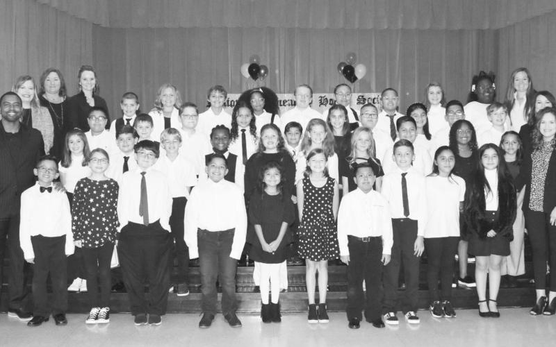 Annie Sims holds NEHS induction ceremony