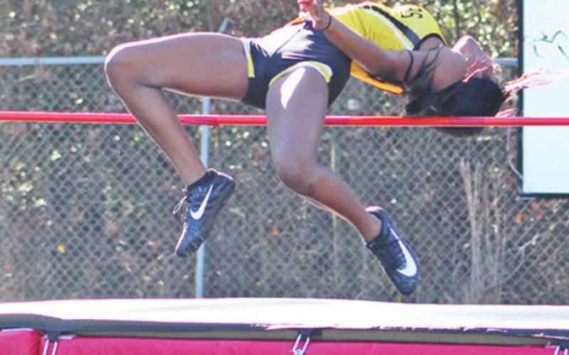Tiyanna Canton clears the bar for 1st in JV high jump. PHOTOS BY ABBY PHELAN