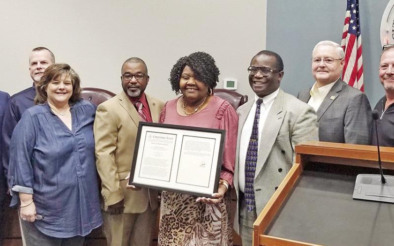 From left, City Manager Ed Thatcher, Councilmembers Henry Chappell, II, and Sherri Spruill, Mayor Tracy Craig, Sr., Mrs. White, Councilmember Jerry Walker, Mayor Pro Tem Tim Dale and Councilmember Galen Adams. COURTESY PHOTO