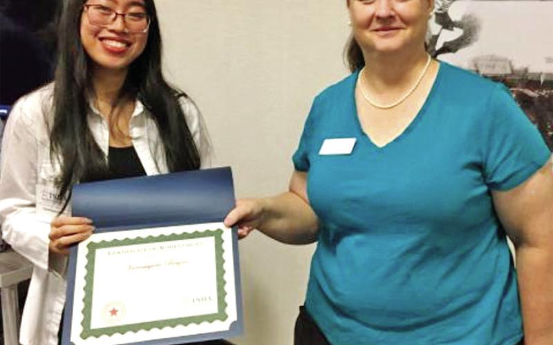 Vanessajane Bayna receiving Caldwell Award