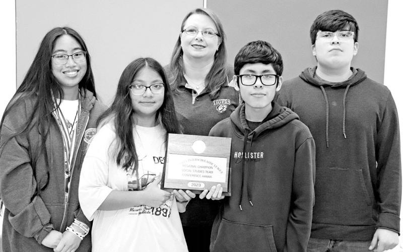 UIL Regional champion and State qualifying Social Studies team. (L to R) Vanessajane Bayna, Jeisy Munoz, coach LeAnne Blalock, Yahir Garcia, Estven Perez