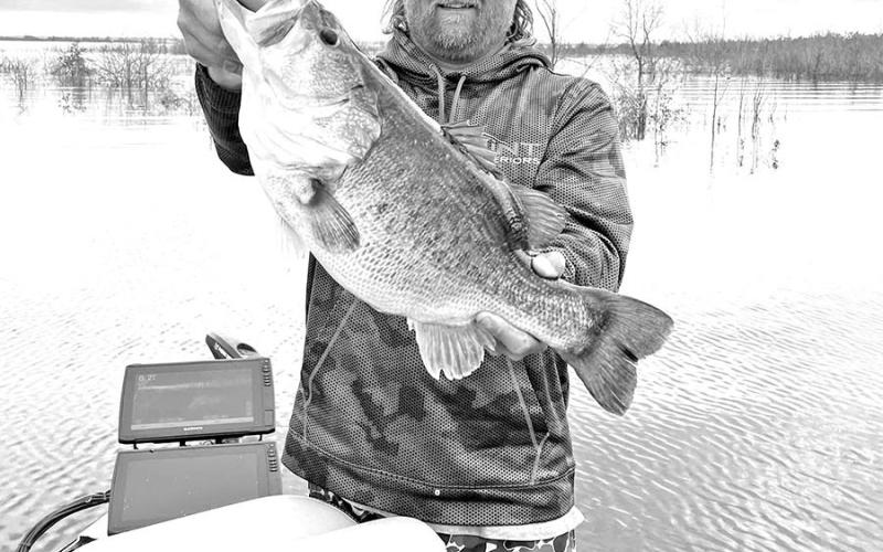 Fishing guide Jason Conn displays the 9.04 pounder he caught at Bois d’Arc Lake on April 24. TPWD fisheries scientists are doing genetics testing on scale samples from the fish to determine if it is one of the 2,000-plus advanced growth Toyota ShareLunker fingerlings released into a 10-acre brood pond in 2019. (Courtesy Photo, Jason Conn)