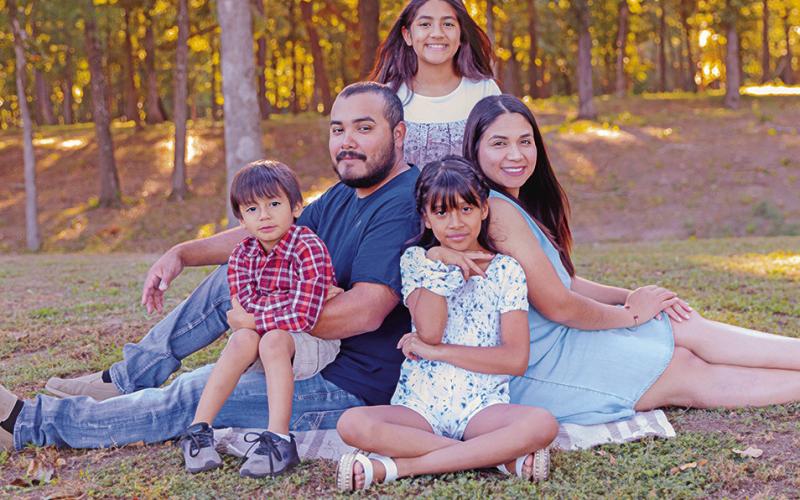 Ana and Erick Torres with their three kids. COURTESY PHOTO