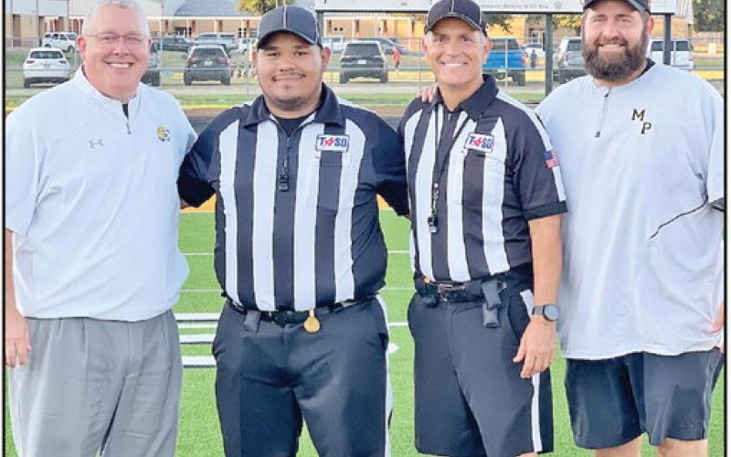 Pictured are: MPISD Superintendent Judd Marshall, Adrian Tapia, John Winn and MPISD Athletic Director Joey Cluley. COURTESY PHOTO