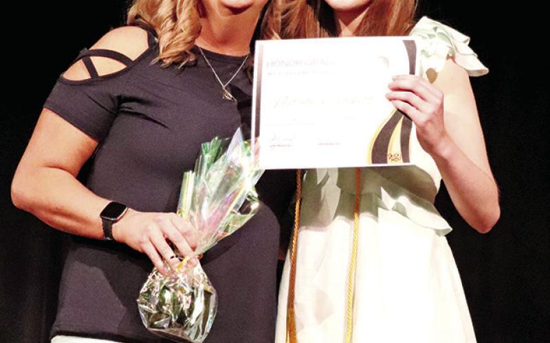 MPHS senior Natalie Crockett with her honored teacher, Lindy Merriman (left)