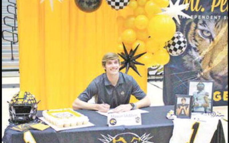 COURTESY PHOTO Mason McMinn signed his letter of intent with Fort Hays State in Hays, Kan. The NCAA Division II Tigers are part of the Mid-America Intercollegiate Athletics Association and finished 7-4 last season.