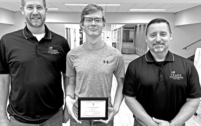 Luke Thurman (center) with MPHS senior counselor, Todd Burns (left), and MPHS Principal, Jason Adams COURTESY PHOTO