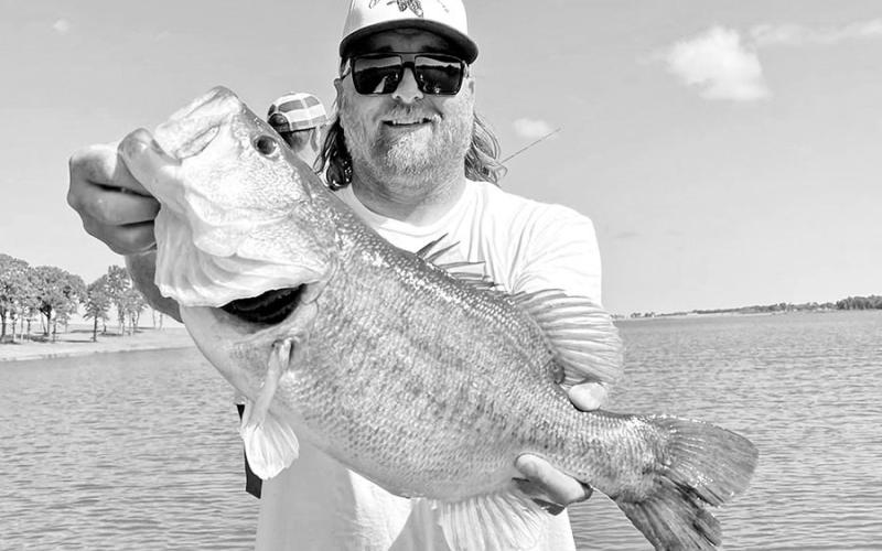Fishing guide Jason Conn with the 8.15 pound Bass Pro Shops Lunker Class ShareLunker he caught and released at Bois d’ Arc Lake in May 2024. Conn submitted scale samples from the fish to TPWD for genetics testing. The test confirmed it was the five-year old daughter of a 14.57 pound Legacy Lunker caught in 2019 from Marine Creek Reservoir. (Photo courtesy of Jason Conn)