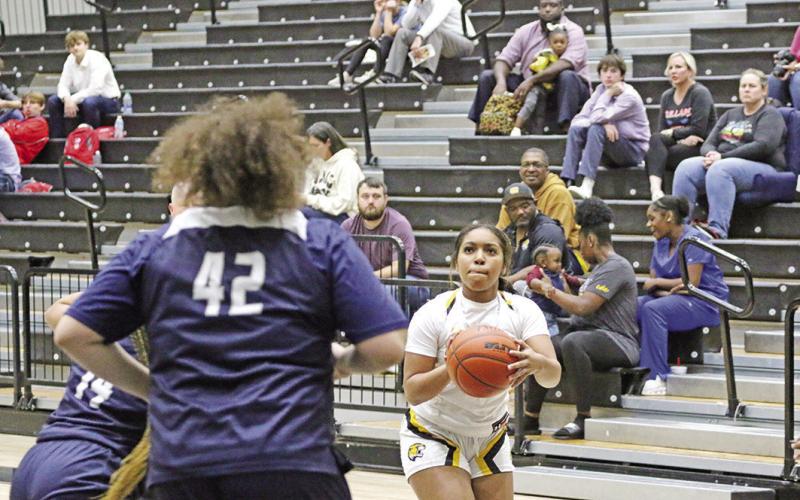 Mount Pleasant’s Ja’Yani Shannon prepares to put up a shot during a recent game. The Lady Tigers, ranked 13th by tabchoops. week. org and fifth by txhsgbb.com, hosted Whitehouse Tuesday and will take part in the Hallsville Tournament next TRIBUNE PHOTO / QUINTEN BOYD