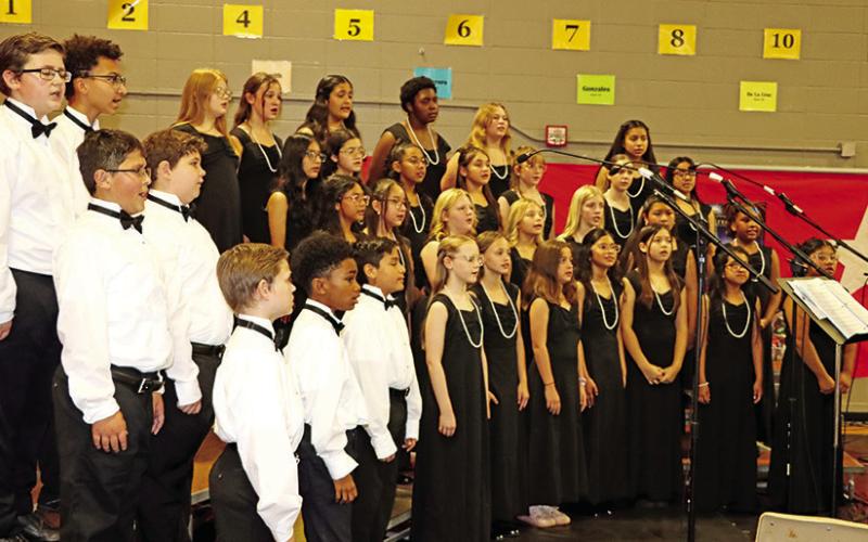 Wallace 5th and 6th grade Honor Choir sing the National Anthem