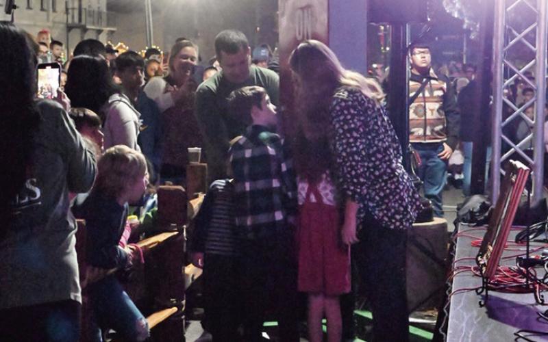 Mount Pleasant - Titus County Chamber of Commerce President Richie Bonney, along with his wife and three children, flipped the switch to light up the downtown square.
