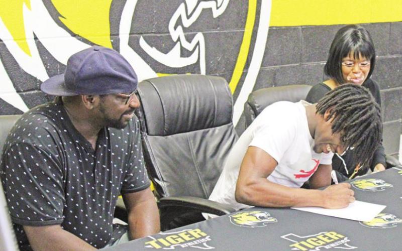 Mount Pleasant running back Edward Wilder recently signed his letter of intent to play football at Oklahoma Panhandle State University, located in Goodwell, Okla. TRIBUNE PHOTO / QUINTEN BOYD