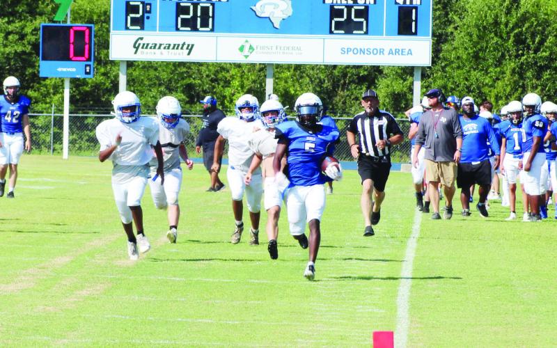 Cam Lowe breaks away from the defense for a touchdown during the live scrimmage. Lowe scored twice in the live scrimmage against Detroit.