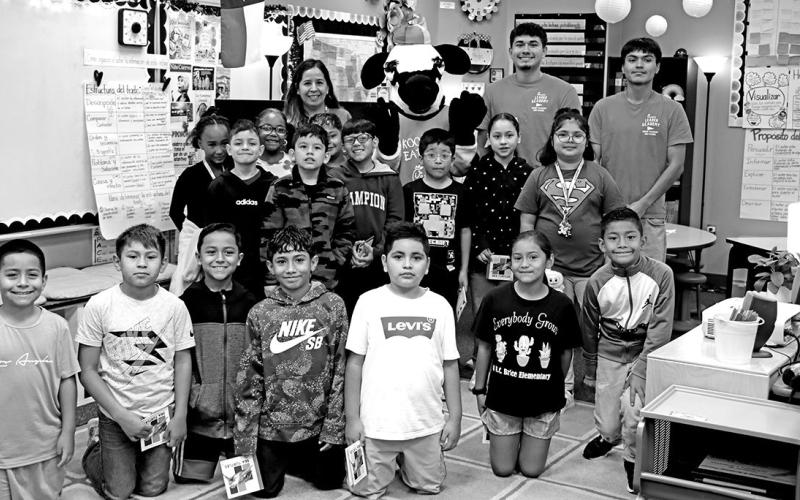 Brice Avila Farias: Back row (L to R) Carmelita Perez, the Chick-Fil-A Cow, Alberto Avila, and Angel Farias with Mrs. Perez’s 3rd grade class at E.C. Brice