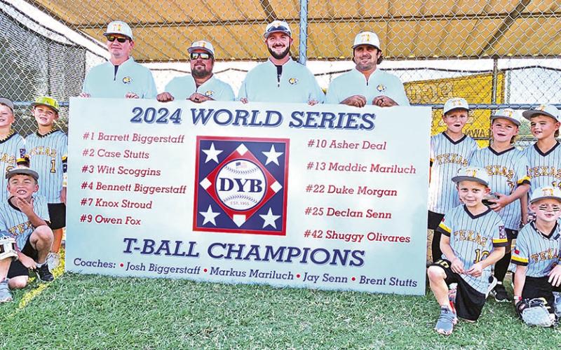MP Youth Baseball 6U team and coaches proudly pose with their brand new banner TRIBUNE PHOTO / NICOLE KIMBALL