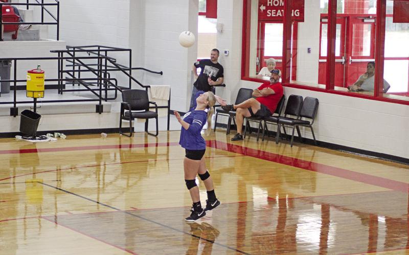 Pewitt’s K.K. Jackson prepares to serve during Saturday’s scrimmage against Hughes Springs.