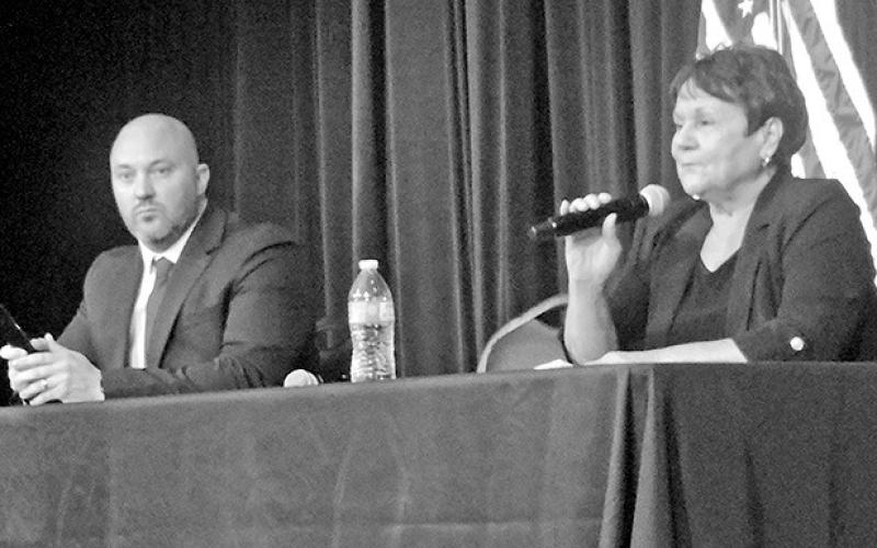 City residents gather for political forum on April 17 Council Place One candidates Trey Baker and Debbie Corbell answer questions