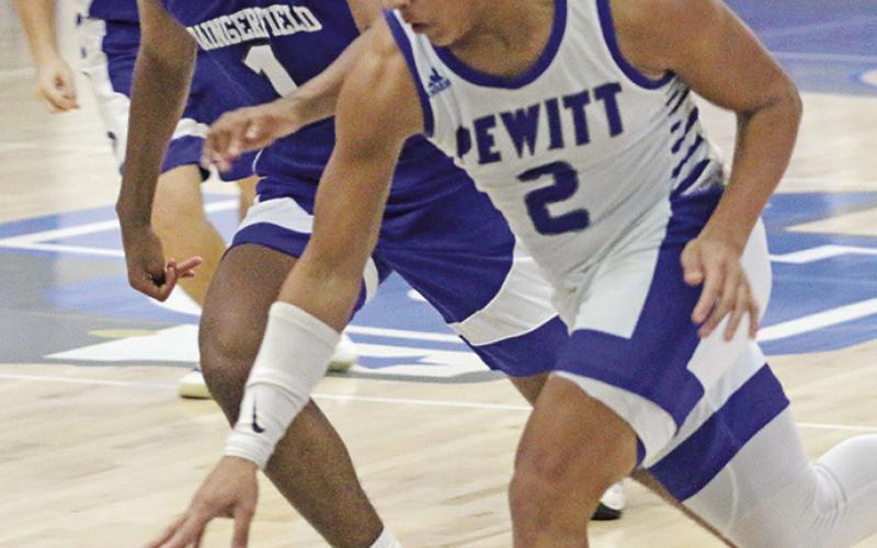 Pewitt’s Michkye Perry chases down a loose ball during Friday’s game. The Brahmas fell at home to Daingerfield, 74-52. TRIBUNE PHOTO / QUINTEN BOYD