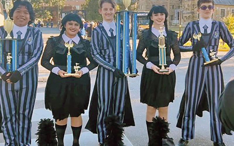 The MPHS Goin’ Gold Band Drum Majors and Color Guard officers with their trophies L to R: Jose Fuentes, Jocelyn Marroquin, Shpat Zeqaj, Addison Heeren, Orion Senence COURTESY PHOTO