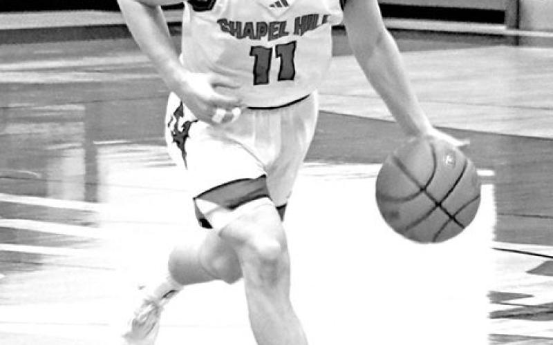 Chapel Hill’s Jace Sullivan (11) dribbles down court during a recent home game. TRIBUNE PHOTOS / MICHAEL S. MCCRACKEN