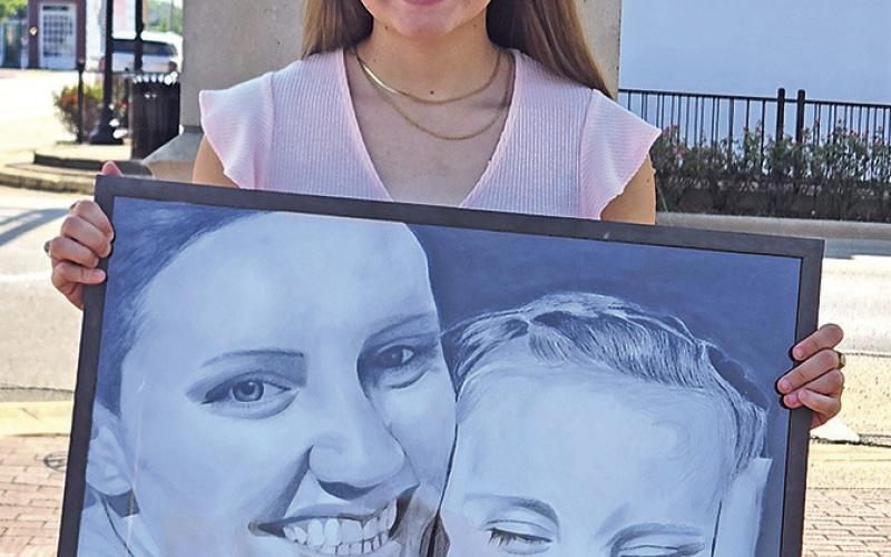 18-year-old Brianne Davis proudly shows her award-win-See ning talents TRIBUNE PHOTO / NICOLE KIMBALL