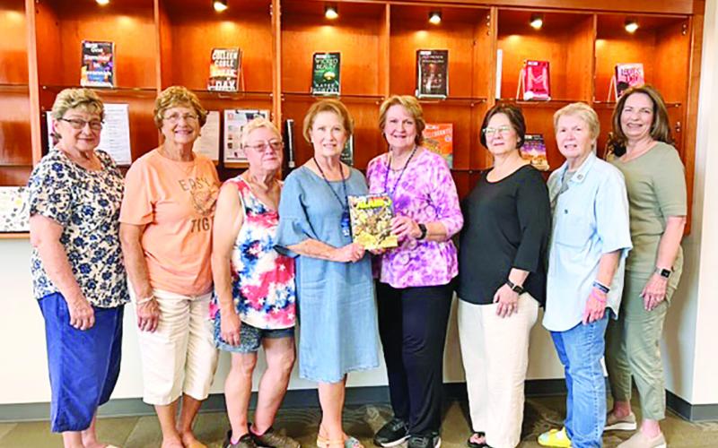 The Martha Laird Chapter of the National Society of the Daughters of the American Revolution recently donated a copy of The Battle of the Alamo to the public library. COURTESY PHOTO