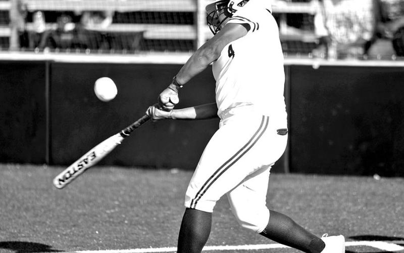Lady Tiger hitter Jakeivia Williams (4) makes contact during a recent at-bat at home. COURTESY PHOTO