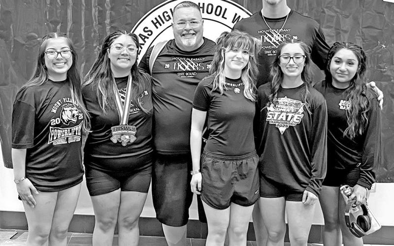 Lady Tiger Powerlifting at the 5A Division II state meet (L to R) Monse Gonzalez, Helen Munoz, Coach Don Woods, Cambria Malone, Coach Blake Lodes, Diana Ramirez, Linnet Cuellar