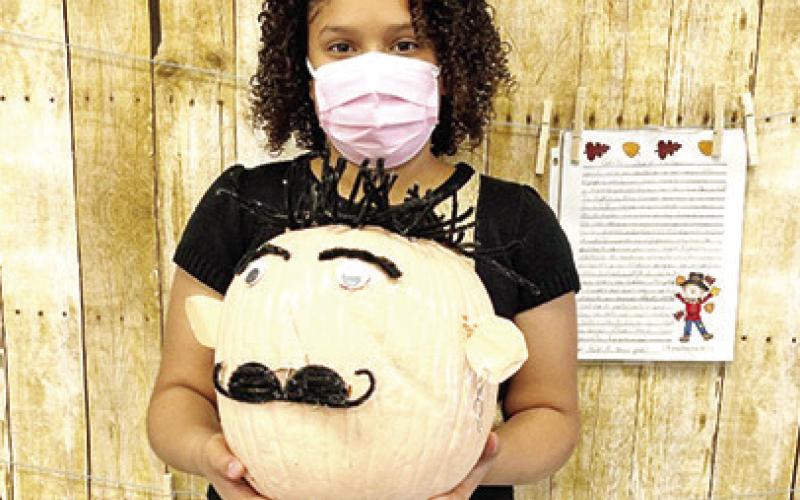 Keila Torres Perez with musician “Camilo”