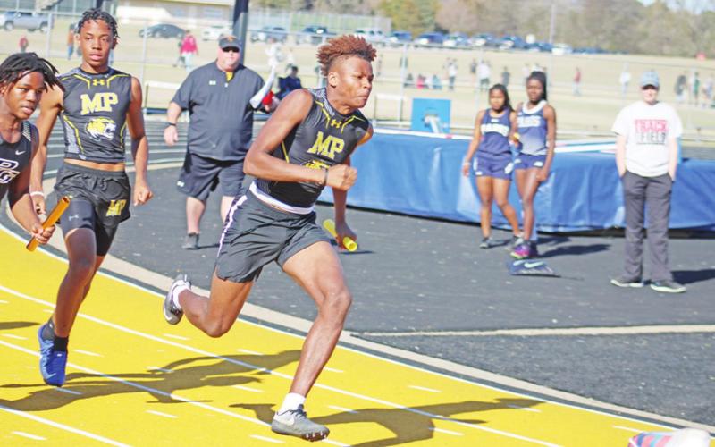 Antez Jeffery takes off during the final leg of the JV boys 4x100 meter relay at Thursday’s Mount Pleasant Invitational. TRIBUNE PHOTO / QUINTEN BOYD