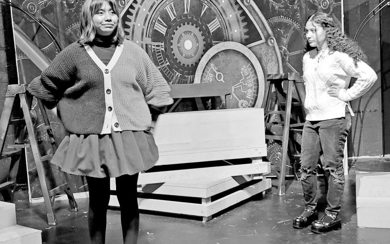 Saray Delarosa (left) and Ashanti Presley (right) rehearse a scene from Alice In Wonderland. COURTESY PHOTO