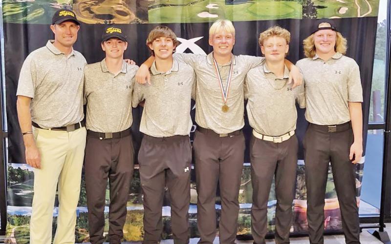 Tiger Golf (L to R) Coach Benny Blaser, Owen Green, Braiden Merryman, Jacob Baker, Brandon Carter, and Hogan Horn