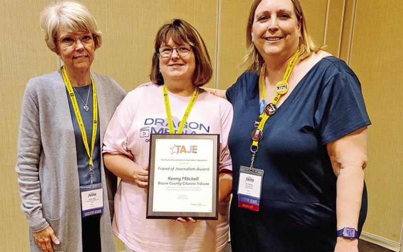 Redwater ISD journalism instructor Tabitha Houchens, center, accepted Mitchell’s Friend of Journalism award on Sunday at the TAJE Fall Fiesta conference in San Antonio. COURTESY PHOTO