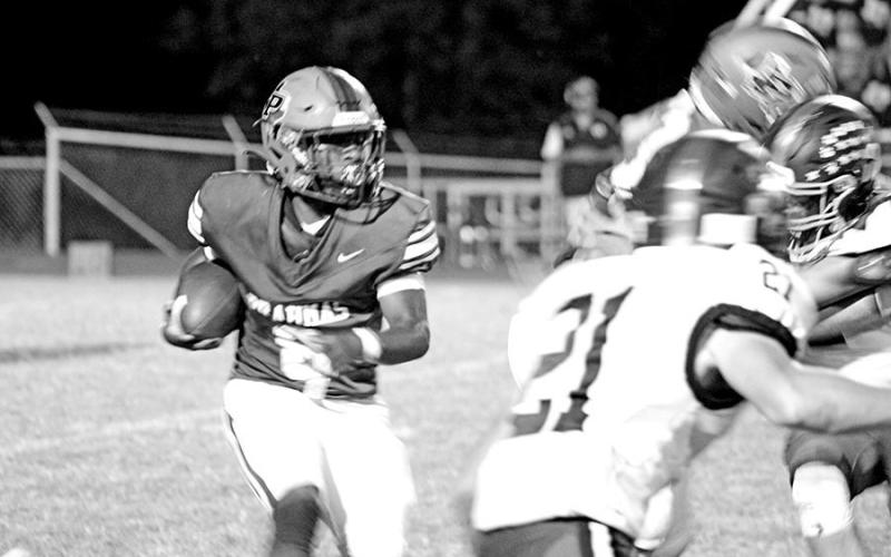 Pewitt running back KD Watson searches for room on a carry during Friday’s game. The Brahmas will open district play at home against Hooks Friday.