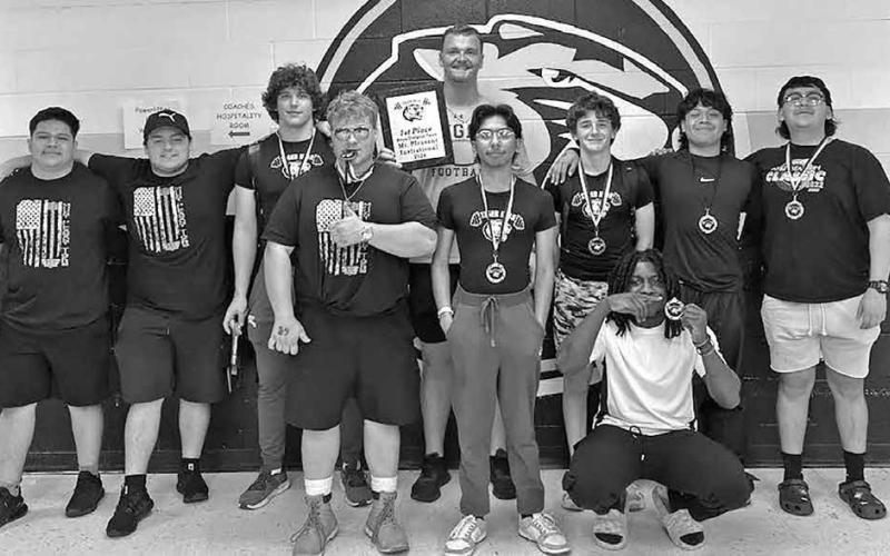 From left: MPHS Tiger Powerlifting team members (L to R) Jose Gonzalez, Andrew Guerette, Ryder Marshall, Clayton Miller, Coach Blake Lodes, Alejandro Castro, Blake Broach, Juymil Lewis, Luis Alvarado, Bruno DeLeon COURTESY PHOTO