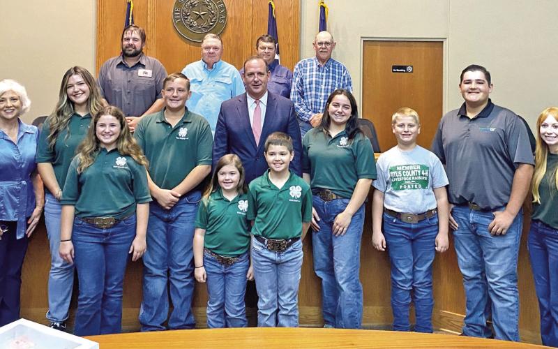 Titus County 4H Club poses with Titus County Commissioners Court after telling them about the State Fair competition COURTESY PHOTO / CASE RODGERS