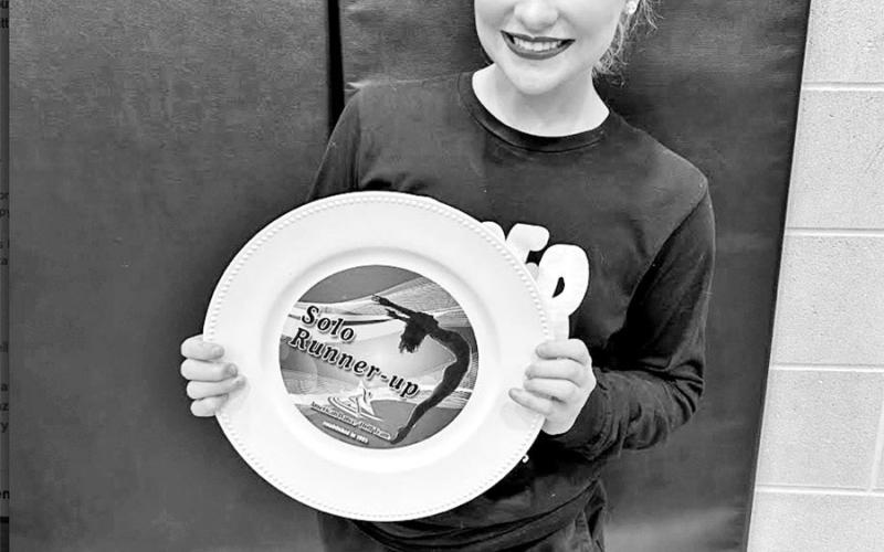Senior Chloe Carter with her solo finalist award