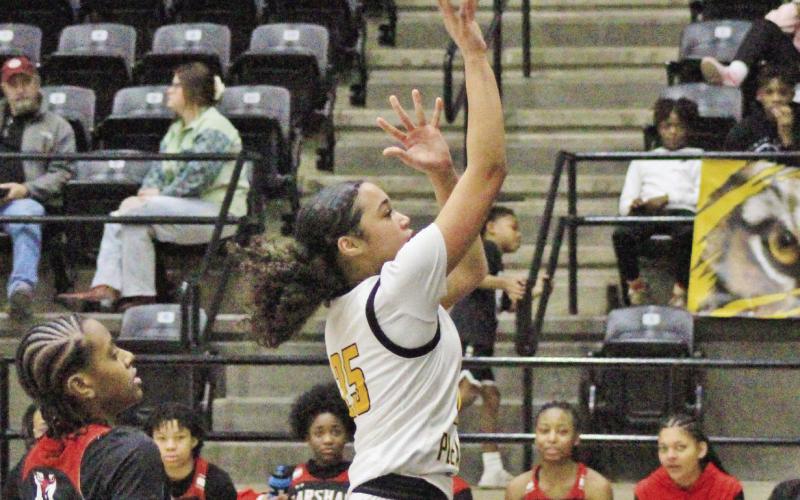 Mount Pleasant’s Kaylin Brannon puts up a shot during the Lady Tigers’ game against Marshall. The Lady Tigers picked up the home win over the Lady Mavs, 52-42. TRIBUNE PHOTO / QUINTEN BOYD