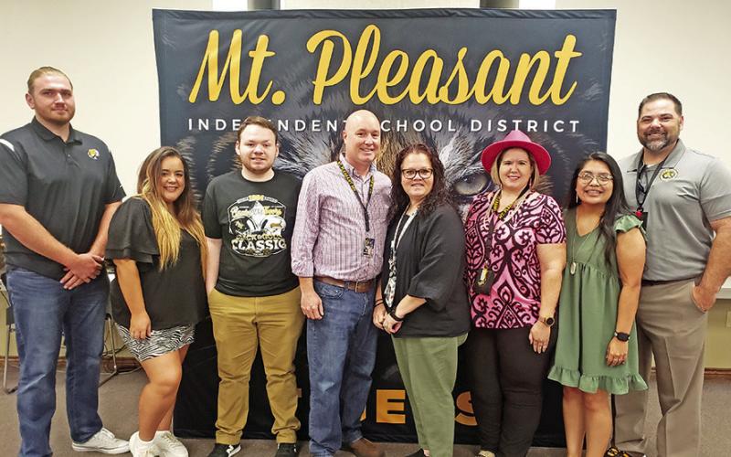 P. E. Wallace Middle School L to R: James Moore, Elizabeth Stone, Hunter Leach, Joey Saurette, Tina Smith, Lindsey Jennings, Daisy Banda, and Wallace Principal Nathan Rider.