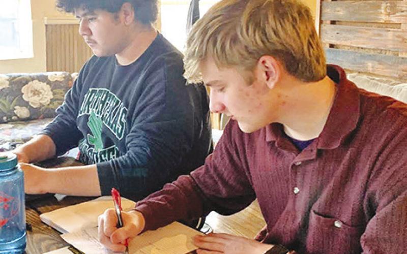 From left: Anthony Orellana and Elijah Rider compete in CX Debate at the online Salado New Year Classic. COURTESY PHOTO