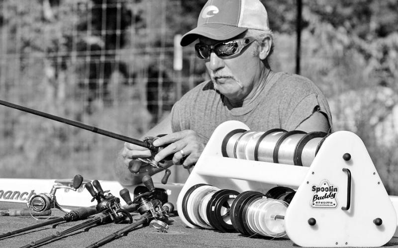 The Spoolin’ Buddy doubles as a fishing line organizer and a spooling station for filling fishing reels with fresh line. (Photo by Matt Williams)