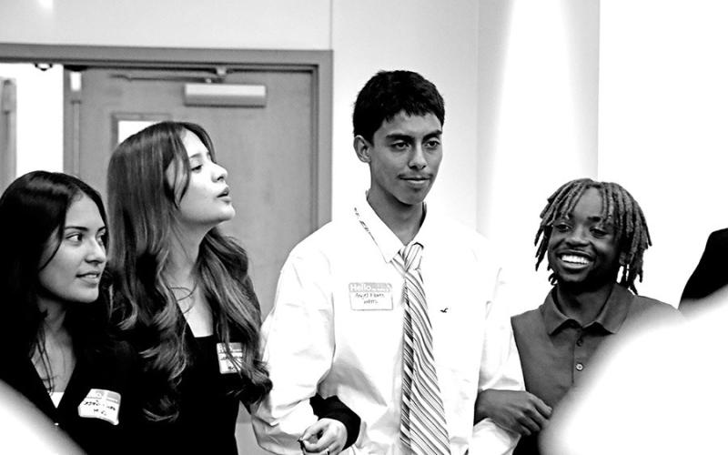 MPHS FBLA members (L to R) Jennifer Luna, Leinad Rodriguez, Angel Flores, and Camauri play an ice breaker game