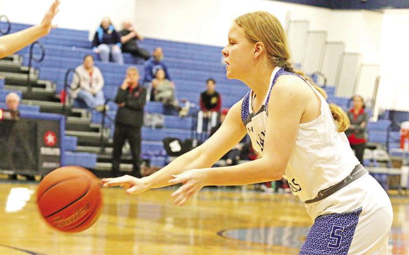 Rivercrest’s Claire Grider delivers a pass during a recent game. The Lady Rebels looked to remain undefeated in district play Friday at home against James Bowie. TRIBUNE PHOTO / QUINTEN BOYD