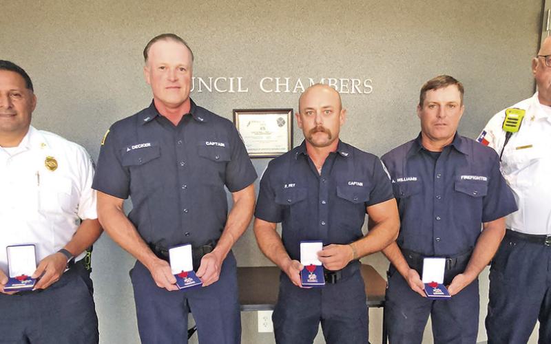 (L to R) Deputy Chief Aristeo Rodriguez, Captain Adam Decker, Driver Phil Fry, Firefighter Aaron Williams, Chief Larry McRae