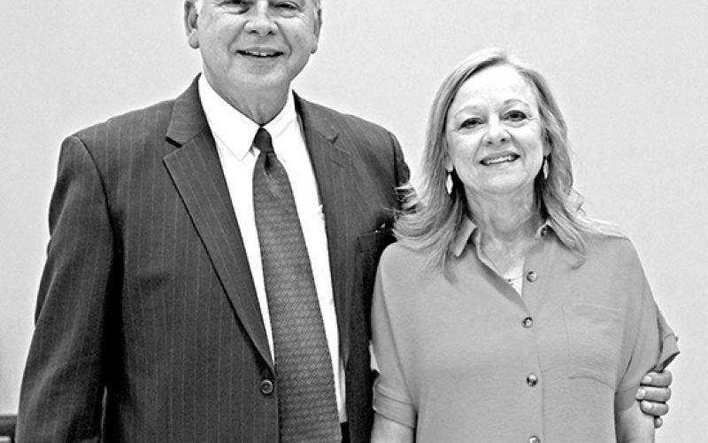 Dr. Clint Davis and his wife pose during his retirement party at First Baptist Church COURTESY PHOTO / FIRST BAPTIST CHURCH