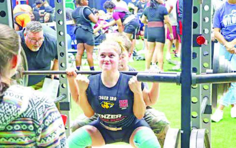 Senior Jordan West squats 220 lbs. West finished in 6th place.