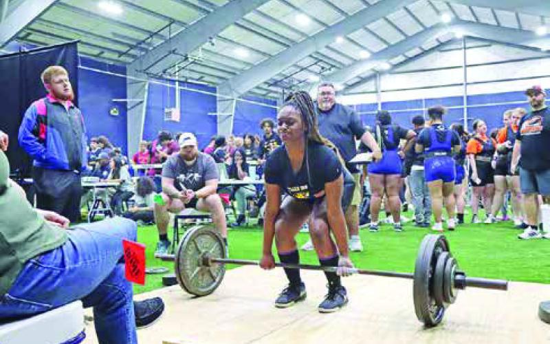 Senior Saniya Milton dead lifts 300 lbs. Milton is the 5th ranked lifter in her weight class in Region 3.