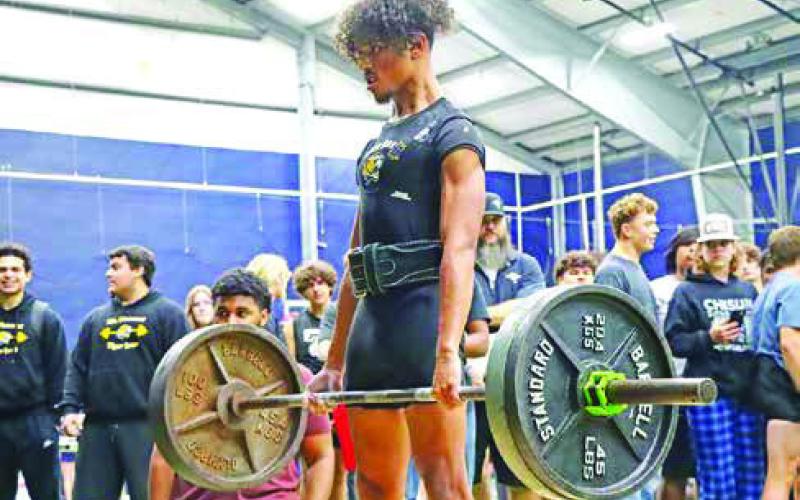 Senior Carl King completes a dead lift. King medaled in 4th place overall. (photos by MPHS Photography student, Yadira Martinez)