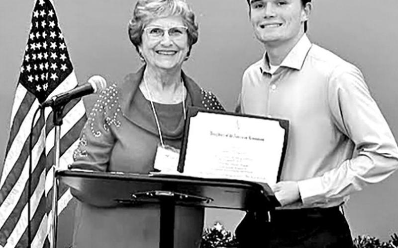 Tanner Marshall (right) with DAR representative Yvonne Hampton at the DAR awards banquet COURTESY PHOTO