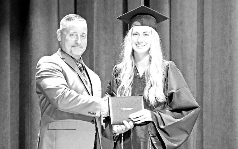 MPHS summer graduate Preslee Landrum (right) and MPHS Principal Jason Adams